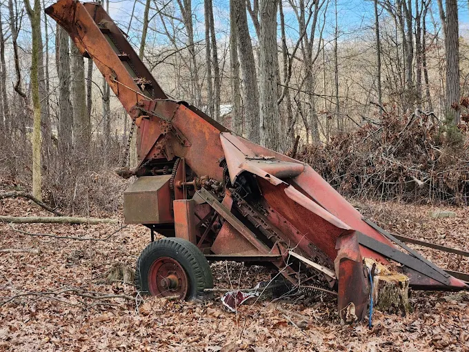 Old rusty farm equipment removed from a rural property in Central PA