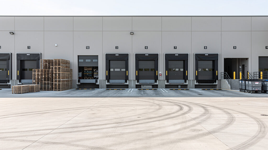 Junk removal truck loaded with office furniture and business equipment