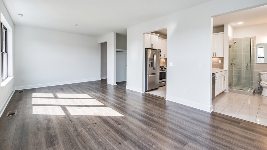 Junk removal truck loaded with property management debris